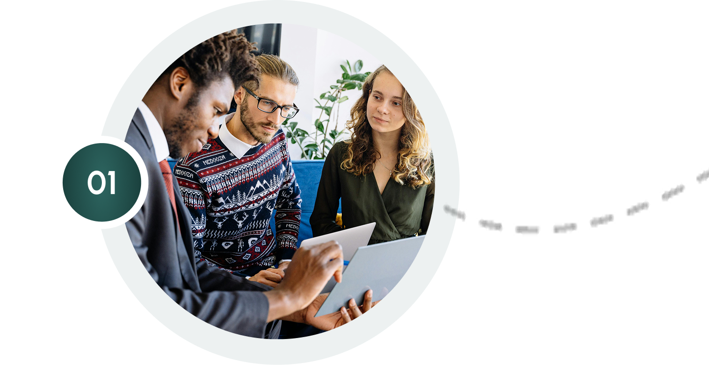 Updated Homepage: Diverse team collaborating on a project, reviewing data on tablets. Business meeting concept.